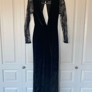 Luxe black velvet, open back, A fitted waist and figure flaunting maxi skirt
